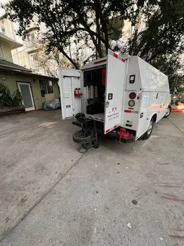 Magnet Plumbing service vehicle on-site for Water Heater Repair in Clearwater Estates